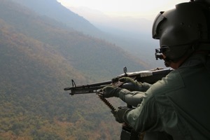 Soldier in helicopter